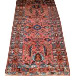 IRANIAN HAMADAN HAND WOVEN WOOL RUG W 3'4'' L 6'2''.having a pink ground and three borders. Small