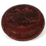 CHINESE CINNABAR COVERED BOX, H 5", DIA 12"Depicting mountains, houses, people and trees. Floral