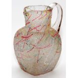 PELOTON GLASS PITCHER, C.1890, H 8 1/2"Handblown colorless glass pitcher with textured exterior