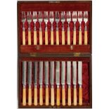 ENGLISH LUNCHEON FLATWARE CIRCA 1880 24 PCSIn mahogany fitted case. 12 engraved knives 8 1/8", 12