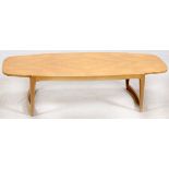 WEIMAN COFFEE TABLE, MID 20TH CENTURY, H 14", W 56", D 23"Marked at the underside with maker's