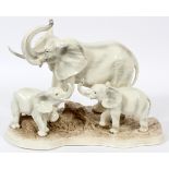 MAJOLICA ITALIAN PORCELAIN ELEPHANTS, H 13", W 16 1/2"Mother elephant with her babies, numbered 55/