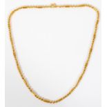 ARABIC .999 GOLD NECKLACE, L 23 1/2"A .999 gold necklace, with alternating beads and bars.