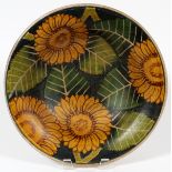 HAND PAINTED POTTERY OPEN BOWL, H 2 3/4",having a yellow flower and green leaf motif inside and