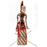 INDONESIAN VINTAGE CARVED WOOD PUPPET, H 20 1/4"Having a hand painted face, jointed arms, period