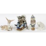 LLADRO PORCELAIN FIGURES AND ANIMALS, 4 PIECES, H 3 1/2"-6"Includes 1 Eskimo youth with a baby polar