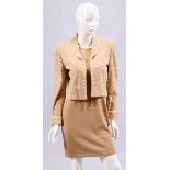 ST. JOHN DRESS WITH JACKET SIZE 8The dress is tan in color with a print jacket in tan and white.Good