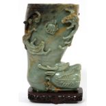 CARVED SERPENTINE DRAGON DESIGN, VASE, H 9 1/2"Carved serpentine vase of green and brown with dragon