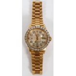 ROLEX OYSTER PERPETUAL DATE JUST 18KT GOLD LADY'S WATCH WITH DIAMONDS ON BEZEL, L 6.5''includes