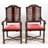 CARVED WALNUT OPEN ARM CHAIRS, PAIR, CIRCA 1920, H 42", W 22", D 25"Cane back panels with leaf