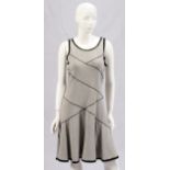 DEREK LAM DRESS, SIZE 10The dress is gray in color with black decorative piping at the front and