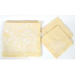 PASTEL YELLOW LINEN NAPKINS & TABLECLOTH, 13Twelve yellow napkins, W 21" x 21" and tablecloth.-