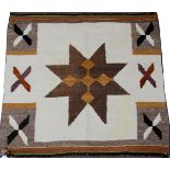 NAVAJO WOOL STAR RUG, C. 1950-1960, W 2' 3", L 2' 5"Anonymous Native American star rug, made of wool