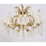 CRYSTAL CHANDELIER, H 24" DIA 27" MARIA THERESA STYLEEight arms. Hand cut crystal prisms. Circa