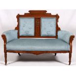 AMERICAN EASTLAKE STYLE WALNUT SETTEE, CIRCA 1900, H 41", W 57"Having inset upholstered back