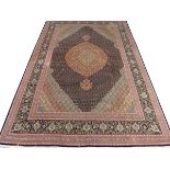 VERY FINE PERSIAN TABRIZ WOOL AND SILK CARPET, 12' X 8' 4"A scalloped diamond design, in shades of