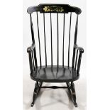 SPINDLE BACK BOSTON ROCKERGlazed black, plank seat. Gilt painted leaf and flower design, back