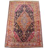 PERSIAN SAROUK WOOL CARPET, SEMI-ANTIQUE, 5' X 3' 6"Having three borders, navy ground, large diamond