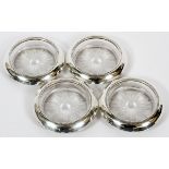 FRANK M. WHITING & CO. STERLING AND CRYSTAL COASTERS, SET OF 4, DIA 3 3/4"Includes a set of four