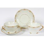 HAVILAND LIMOGES PORCELAIN CUPS & SAUCERS, TEN SETSGold edge. Circa 1930. Retailed by Burley & Co.