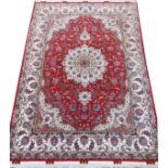 VERY FINE TABRIZ SILK CARPET, 7' X 5'A silk foundation and silk highlights; having a red center