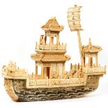 CHINESE 'TOWERED', PANELED BONE SHIP IN GLASS CASE, H 21", W 7", L 24"Depicts a Chinese 'Towered'