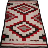 NAVAJO WOOL RUG, 5' 8" X 3' 10"C. 1920-1950.A little wear with some knots showing.- For High