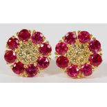 2.4CT RUBY AND DIAMOND STUD EARRINGS, PAIR, DIA 3/8"Studded with a total of 2.4cts of round cut