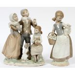 LLADRO PORCELAIN FIGURES, 2 PIECES, H 9 1/2", "CHRISTMAS CAROLS" & "GIRL WITH LAMB"Including the