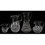 CRYSTAL WATER PITCHERS, 4, H 4 1/2"-10"One made in Poland, the others in Germany.Good condition