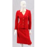 ADOLFO COTTON BLEND SKIRT SUITRed knit wool blend jacket with button closure and matching skirt;