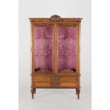 An early 20th.C oak display cabinet