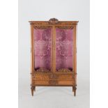 An early 20th.C oak display cabinet