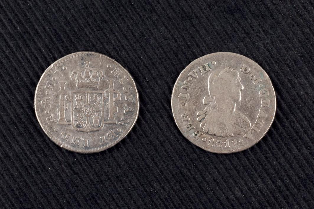 Ten Spanish coins: 1/2 real. Fernando VII