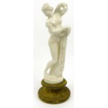 Carved alabaster figure of a maiden mounted on a wooden velvet base, 33cm high excluding the