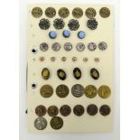 Selection of gilt metal, silver metal and coloured glass buttons including zodiac signs, mounted