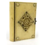 Victorian ivory backed French religious book, dated 1856, with silver metal clasp, 11.5cm long : For