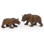 Two wooden Black Forest carved bears, both with beaded glass eyes, the larger 18cm diameter : For