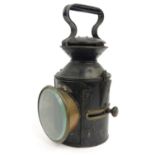 Black painted railway interest lamp stamped Kings Lynn 101, 33cm high :For Condition Reports