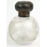 Globular glass and silver scent bottle, the lid embossed with Art Nouveau style flowers, the body