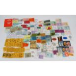 Extensive collection of unused stamps, predominantly in booklets, including £1 books, £3.08 book, £