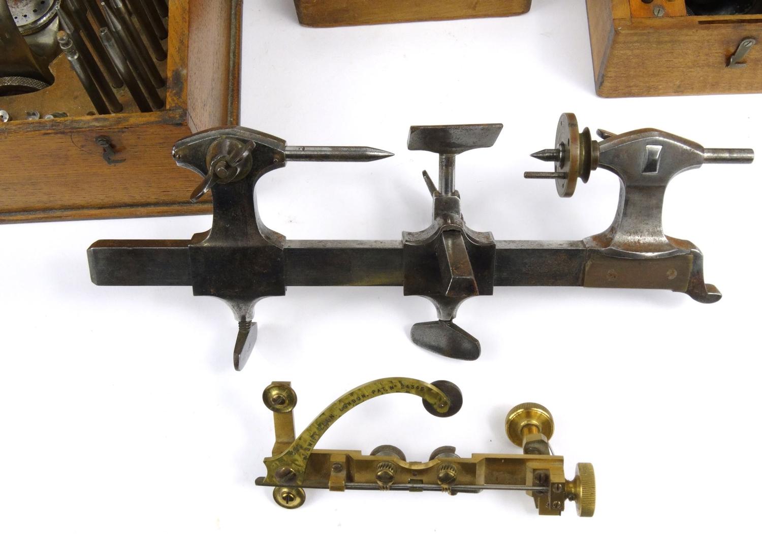 Three wooden cased watchmaker's toolkits J. Swift & Son, London :For Condition Reports please - Image 4 of 6