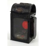 Railway interest Chas H. Andrews London tinplate lantern with red glass lens, 18cm high :For