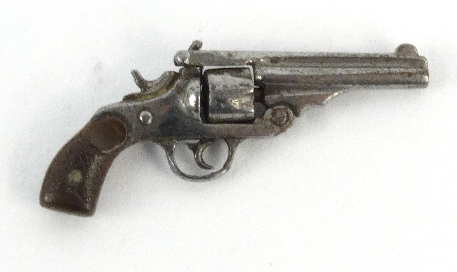 Miniature gun watch key, 3cm long :For Condition Reports please visit www.eastbourneauction.com