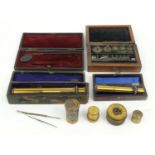 Selection of scientific instruments including boxed Mayfield & Co lens, boxed John Browning lens,