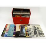 Case of rock and easy listening LP records including John Lennon, Bob Dylan, Elton John, The