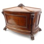 Victorian mahogany wine cooler with floral and leaf carved top and lion paw feet, approximately 53cm