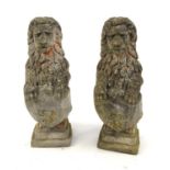 Pair of lion garden stoneware statues, both 74cm high : For Condition Reports Please visit www.