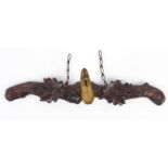 Wooden Black Forest coat rail carved with acorns and with hoofed foot hook, 50cm wide :For Condition