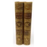 Two volumes of A History of the Earth and Animated Nature by Oliver Goldsmith with coloured